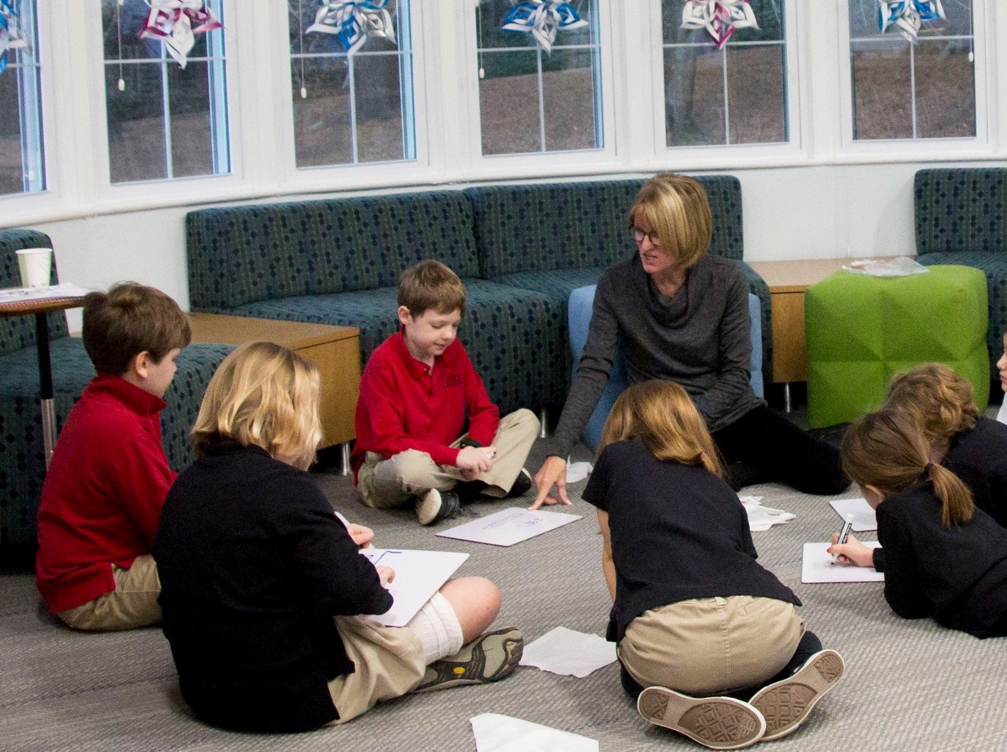 16665909_10154427326813576_1286709786263411817_o math in library with teacher