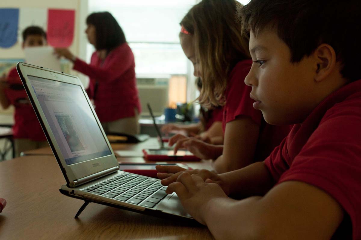 student on computer