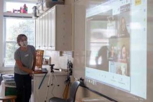 IMG_9866 teacher working on smart board