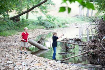 IMG_9821 Two students fishing in the creek