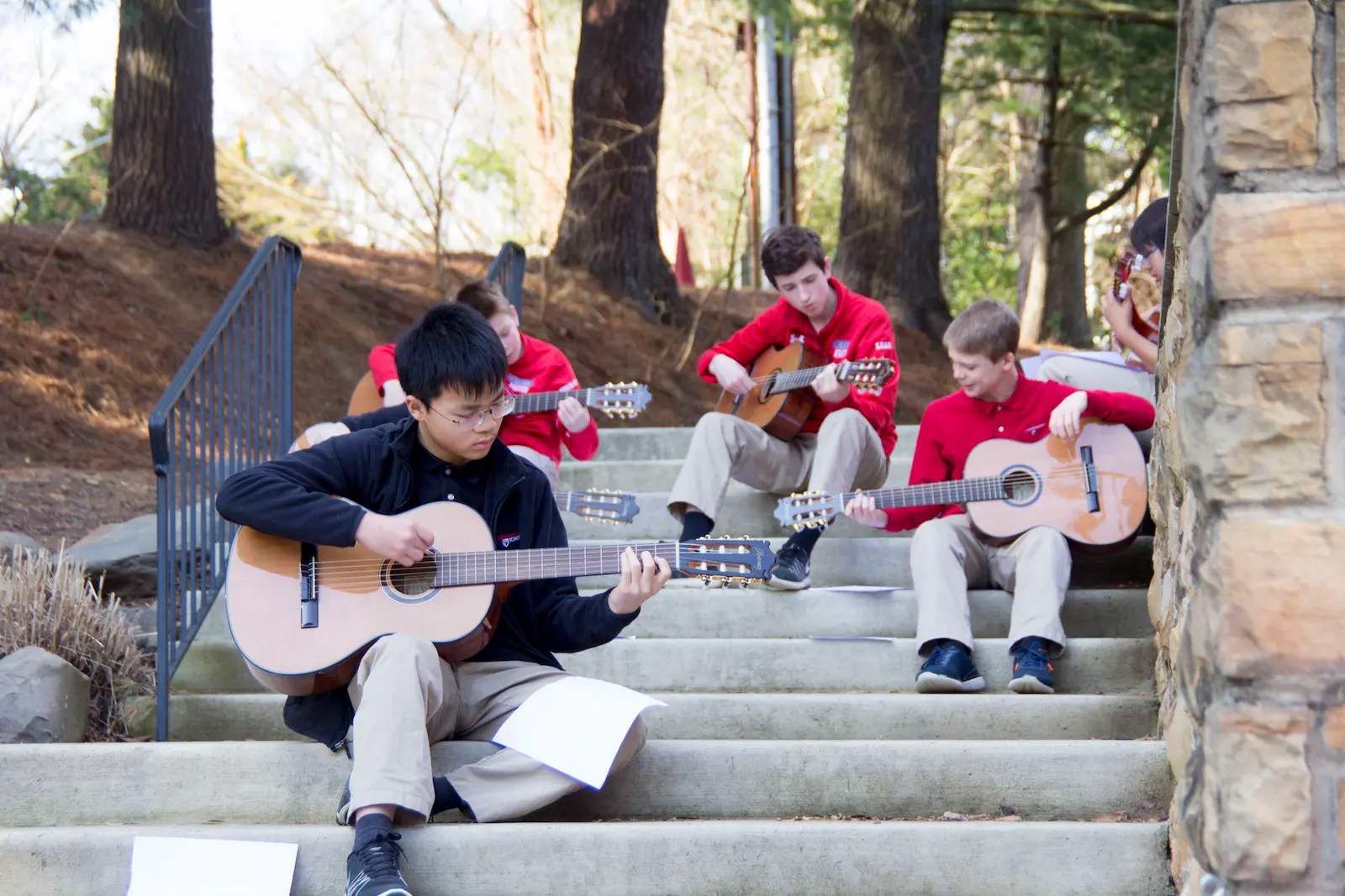 Kids playing guitars