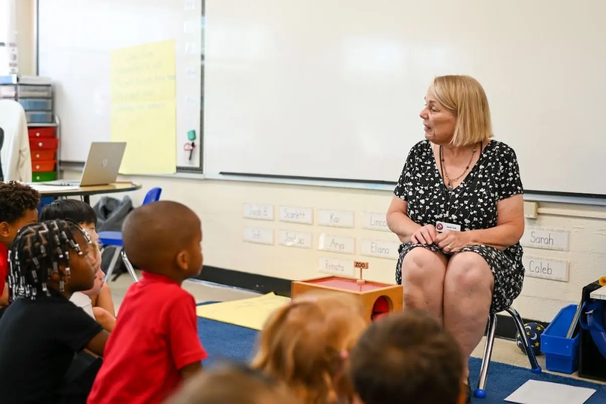 Kids listening to a teacher